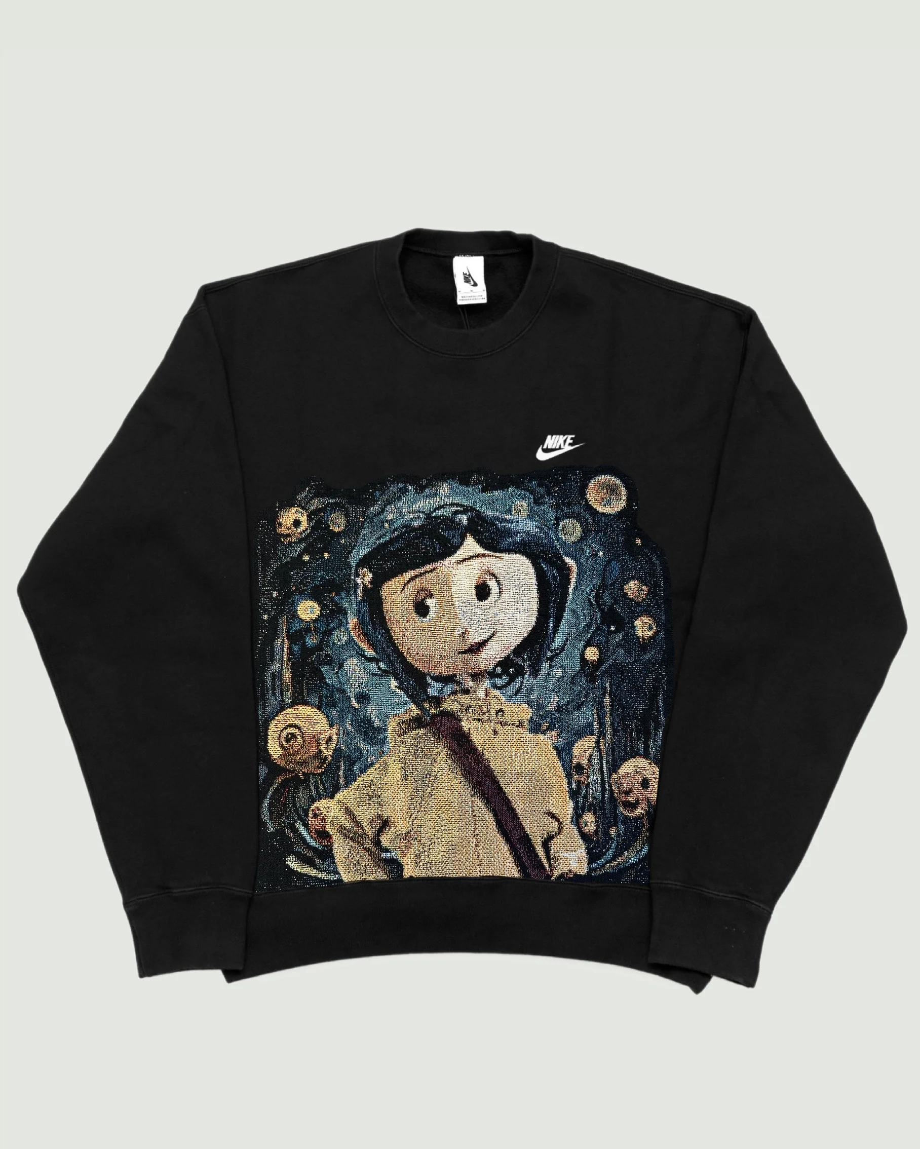 VA-AW23-687 CORALINE NIKE RETRO REWORK CREWNECK